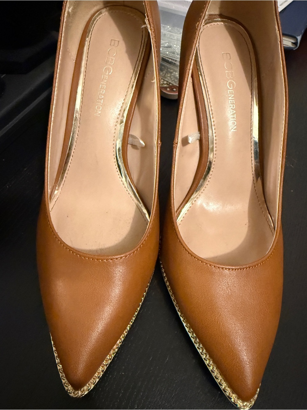 BCBGeneration Tan Pointed Toe Pumps with Gold Trim Accent